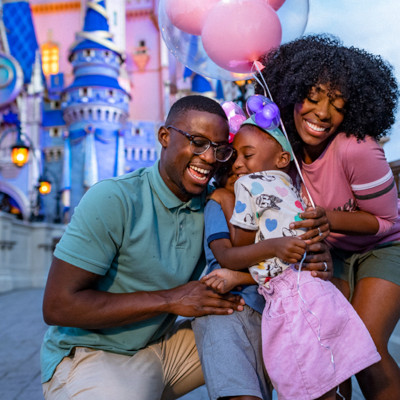 Family - man, woman, and young girl at Disney World Orlando
